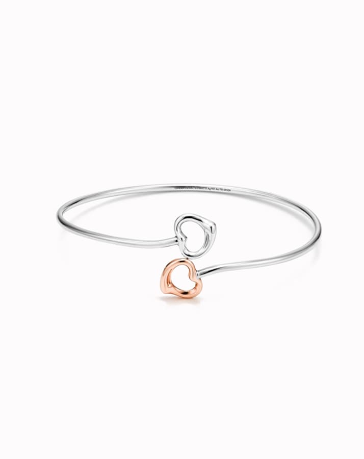 EMERALD-CUT HALO ENGAGEMENT RING WITH A DIAMOND PLATINUM BAND