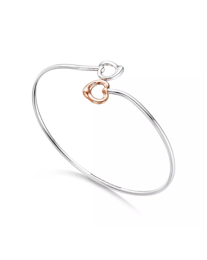 EMERALD-CUT HALO ENGAGEMENT RING WITH A DIAMOND PLATINUM BAND